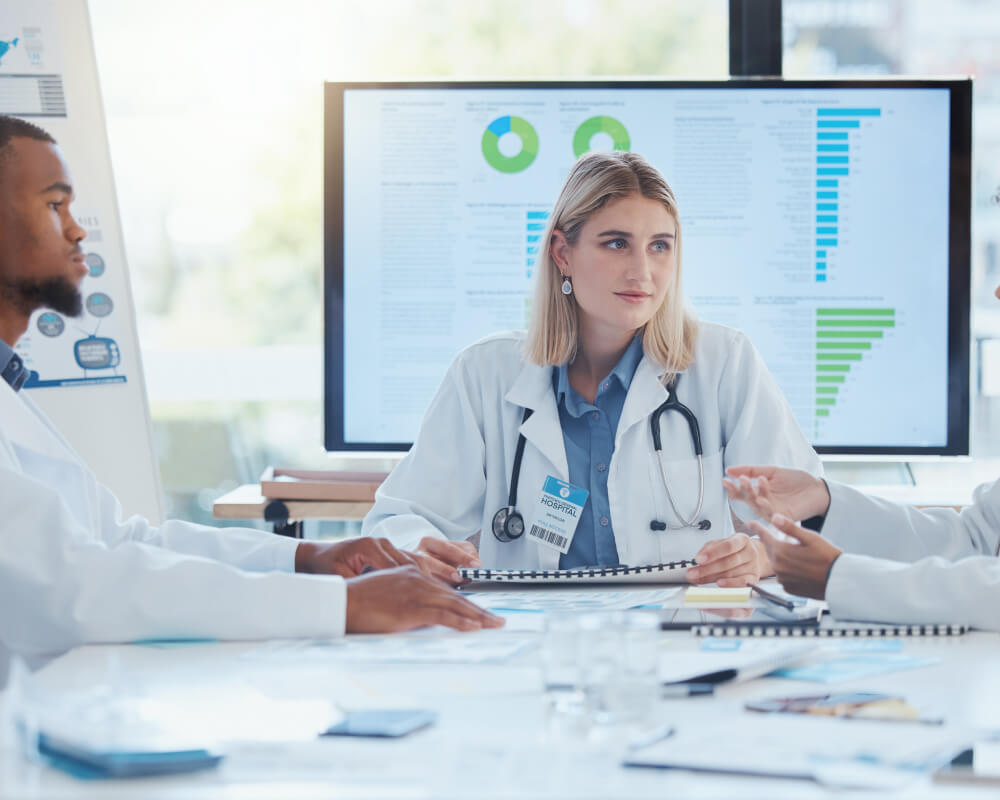 Doctors showing a form